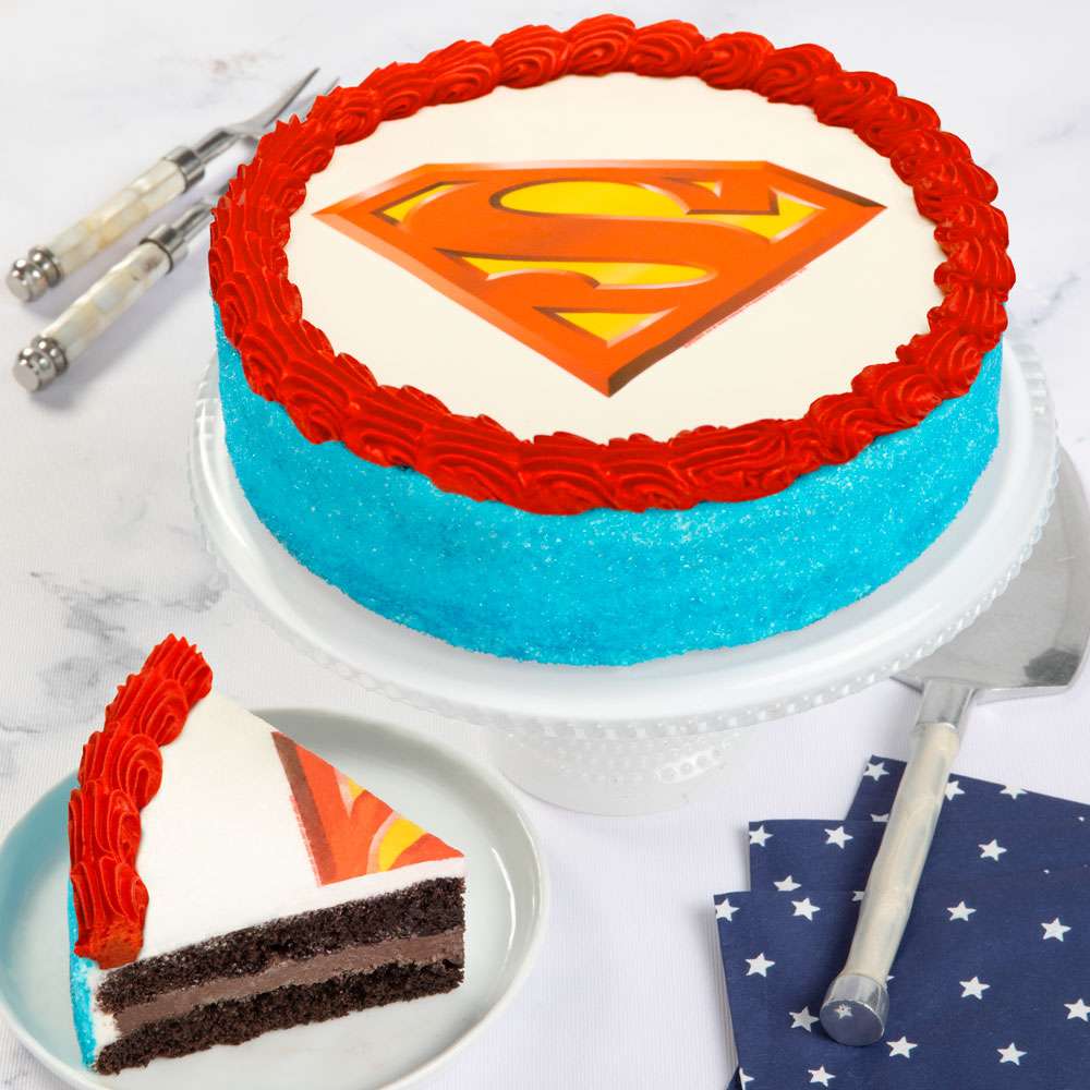 i heart baking!: superman birthday cake - white cake filled with whipped  cream and strawberries and covered with cream cheese frosting